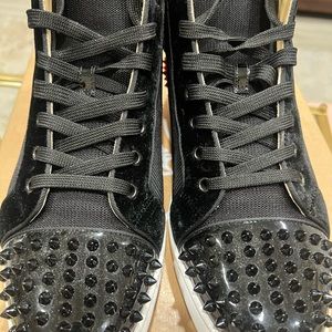 Men’s Authentic Christian Louboutin sneakers.